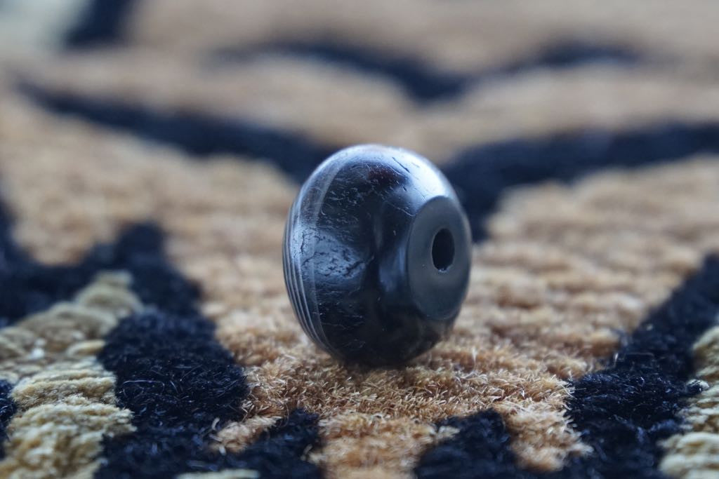 Ancient Indo Tibetan dzi sulemani bead AT-18