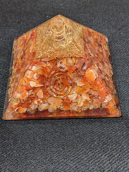 Orgonite Pyramid with Carnelian and spiral symbol