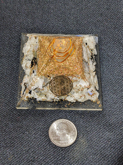Orgonite pyramid with Rainbow Moonstone and flower of life symbol